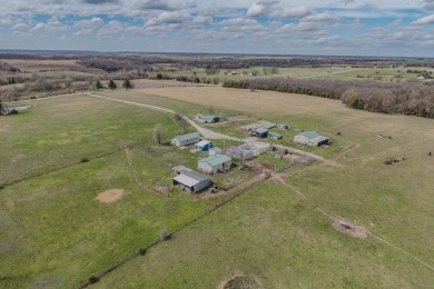 Price Drop on Two Homes/80ac with a large pond, Barns & More! If
