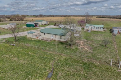 Price Drop on Two Homes/80ac with a large pond, Barns & More! If