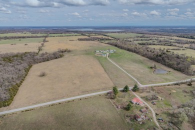 Price Drop on Two Homes/80ac with a large pond, Barns & More! If