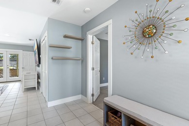 Nestled on the pond in the sought-after Fairways community of