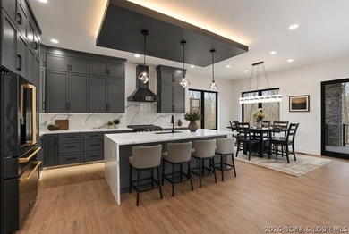 Welcome to your new modern retreat in Porto Cima. This stunning - photo 4