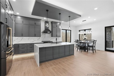 Welcome to your new modern retreat in Porto Cima. This stunning - photo 5