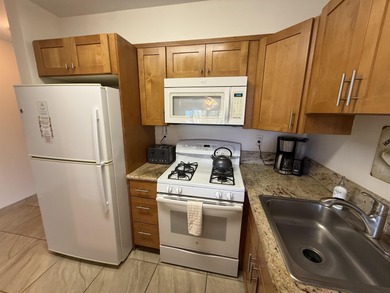 GROUND FLOOR UNIT!! Walk out onto the lanai, into the garden, to - photo 14