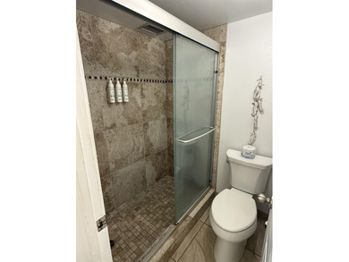 GROUND FLOOR UNIT!! Walk out onto the lanai, into the garden, to - photo 18