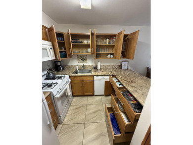 GROUND FLOOR UNIT!! Walk out onto the lanai, into the garden, to - photo 28