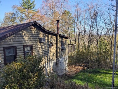 Tucked into one of the highest points in Smallwood, this - photo 1