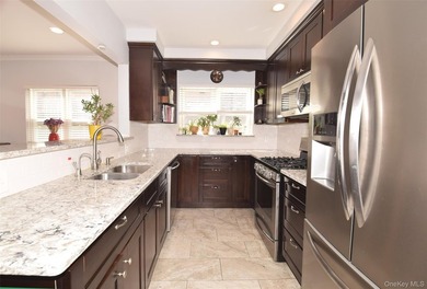 Welcome to this beautifully renovated semi-detached home in the - photo 8