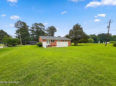 2401 N Hills Dr is a 1-story New Bern brick ranch built in 1973 - photo 1