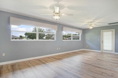 NEW METAL ROOF! Tucked away on a peaceful half-acre lot just - photo 14