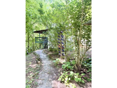 Singlewide home sitting on 1.45 +/- unrestricted acres! Nestled - photo 1