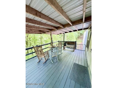 Singlewide home sitting on 1.45 +/- unrestricted acres! Nestled - photo 3