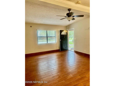 Charming 3BR/1BA concrete block home with major updates and a - photo 3