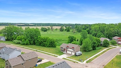 This newer three-level home situated on a 1 acre spacious corner - photo 3