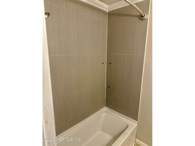 Charming 3BR/1BA concrete block home with major updates and a - photo 4