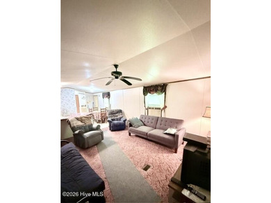 Singlewide home sitting on 1.45 +/- unrestricted acres! Nestled - photo 5