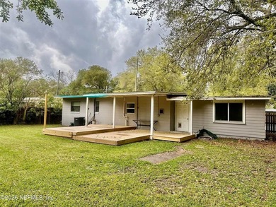 Charming 3BR/1BA concrete block home with major updates and a - photo 5