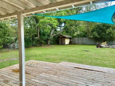 Charming 3BR/1BA concrete block home with major updates and a - photo 6