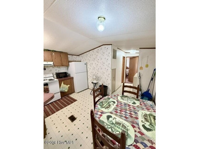 Singlewide home sitting on 1.45 +/- unrestricted acres! Nestled - photo 7