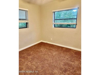 Charming 3BR/1BA concrete block home with major updates and a - photo 9