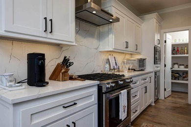 This fantastic Hickory Hills home was custom built by Jim Colton