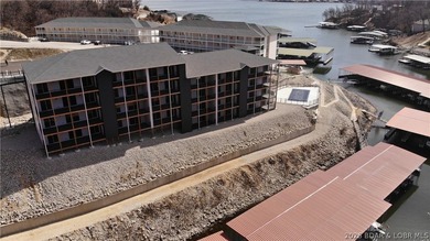 NEW CONSTRUCTION WITH A BOAT SLIP! You heard it right. Two *must - photo 2