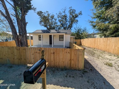 Check out this cozy home with a covered front porch, newly - photo 3