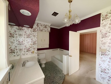 Give us a call for a showing on this huge home located in the - photo 11