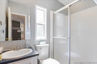 Discover this beautifully updated 4-bedroom, 3-bath lakefront - photo 12