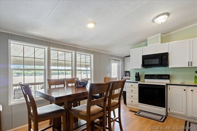 Discover this beautifully updated 4-bedroom, 3-bath lakefront - photo 13