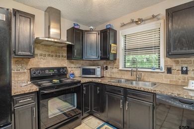 Enjoy lake front living in this charming 2-bedroom 2-bathroom - photo 14