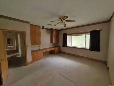 Give us a call for a showing on this huge home located in the - photo 15