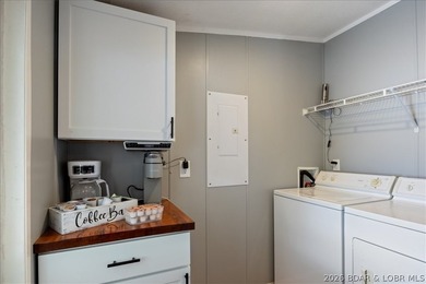 Discover this beautifully updated 4-bedroom, 3-bath lakefront - photo 16