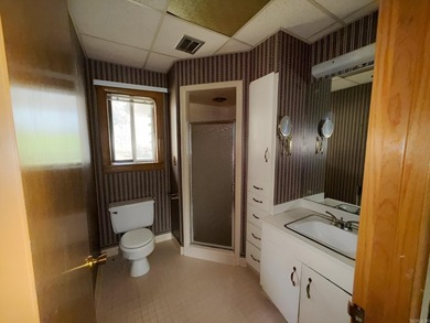 Give us a call for a showing on this huge home located in the - photo 16