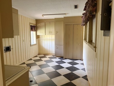 Give us a call for a showing on this huge home located in the - photo 18