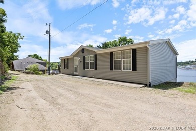Discover this beautifully updated 4-bedroom, 3-bath lakefront - photo 26