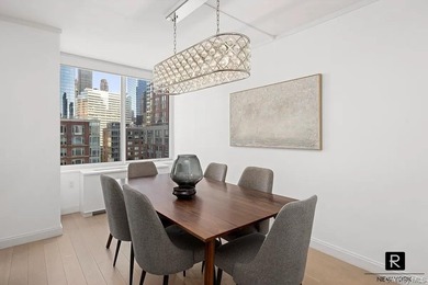 Welcome home to residence 15A at River and Warren. This sun - photo 4