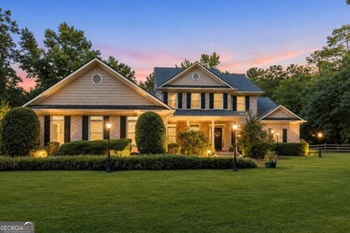 Situated on over an acre, this exceptional 5-bedroom, 4.5-bath - photo 2