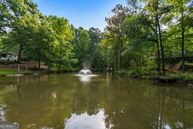 Situated on over an acre, this exceptional 5-bedroom, 4.5-bath - photo 3