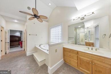 Situated on over an acre, this exceptional 5-bedroom, 4.5-bath - photo 8