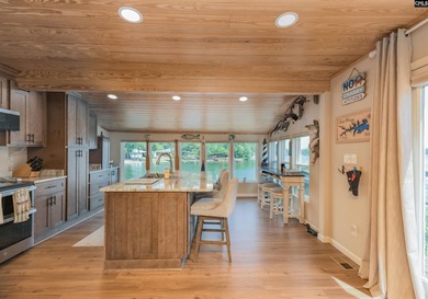 Experience refined waterfront living in this completely - photo 11