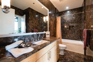 This stunning 2-bedroom, 2-bath condo is located on one of the