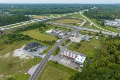 Prime location! Building in place with a new roof with gas tanks