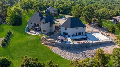 Welcome to a one-of-a-kind luxury estate in a gated Osage Beach - photo 1
