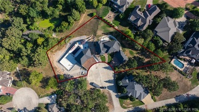Welcome to a one-of-a-kind luxury estate in a gated Osage Beach - photo 2