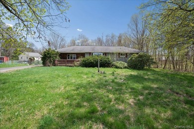 Set on a generous parcel in a quiet Hudson setting, this - photo 3