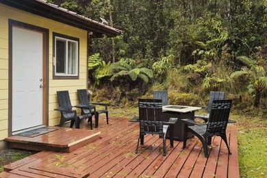 Cottage-style home on approximately 1/4 acre in a forested - photo 1