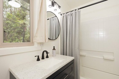 Cottage-style home on approximately 1/4 acre in a forested - photo 6