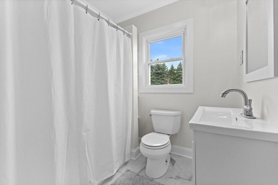 Welcome home to this beautiful Lake Geneva bungalow! Because the - photo 11