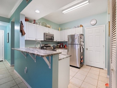 Experience elegant first-floor living in this well-appointed - photo 11
