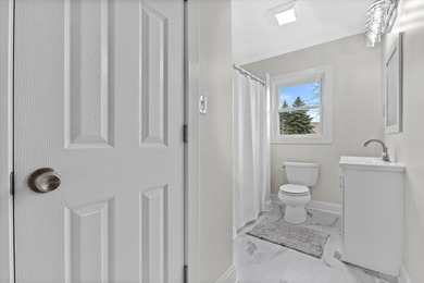 Welcome home to this beautiful Lake Geneva bungalow! Because the - photo 18